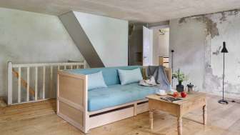 Wohnzimmer mit Schlafsofa